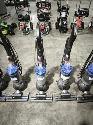 Dyson Ball Multi Floor 2 vacuum, model UP19, new condition, blue cyclone component, auction labels visible.