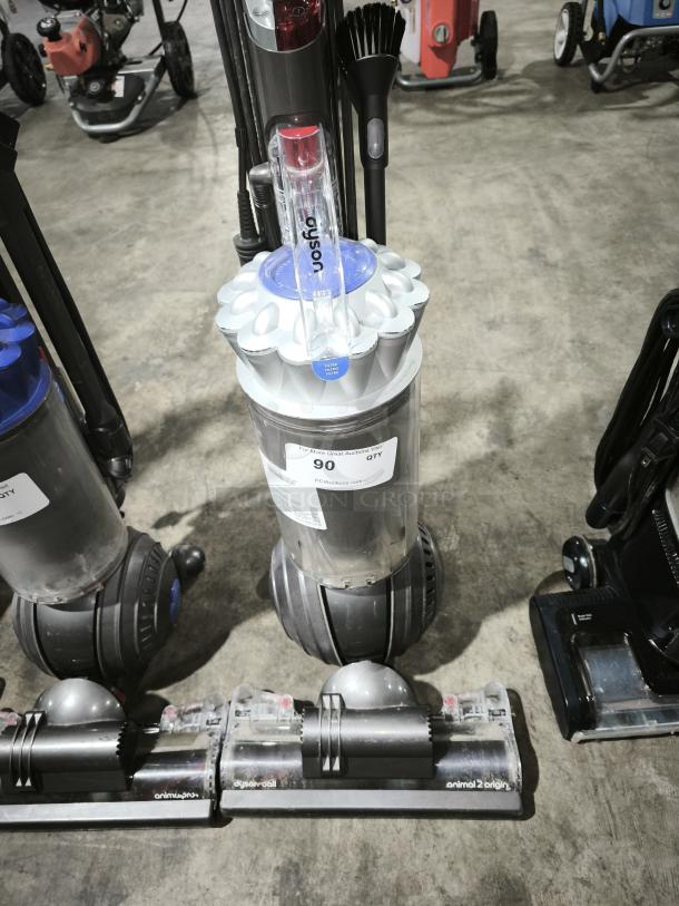 Dyson Ball Multi Floor 2 vacuum, model UP19, in used condition; features ball technology and multiple attachments.