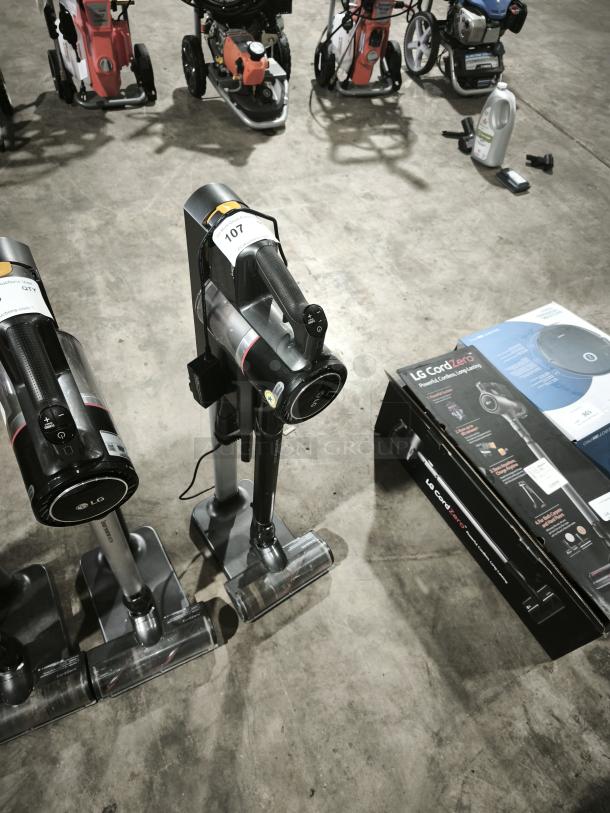 LG CordZero A9 cordless stick vacuum model A916BM, displayed with original packaging, numbered 107, in excellent condition.