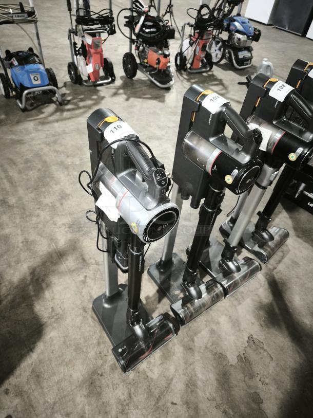 LG CordZero A9 cordless stick vacuum, model A916BM, in used condition, with visible auction tag.