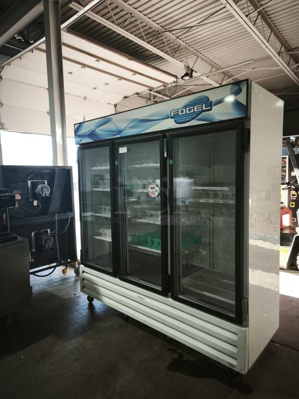 Fogel CR-65-US 78" wide reach-in refrigerator with three hinged glass doors, approx 65 cu ft, used, visible model label.