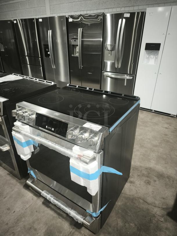 New GE Café 30″ Smart Slide-In Range CES700P2MS1, radiant cooktop, convection oven, pristine condition, protective wrap.