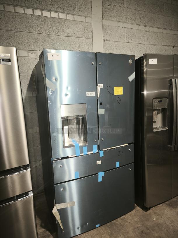 GE Profile™ 27.9 cu ft Smart 4-Door French Door Refrigerator, Model PVD28BYNFS, wrapped in protective blue tape.