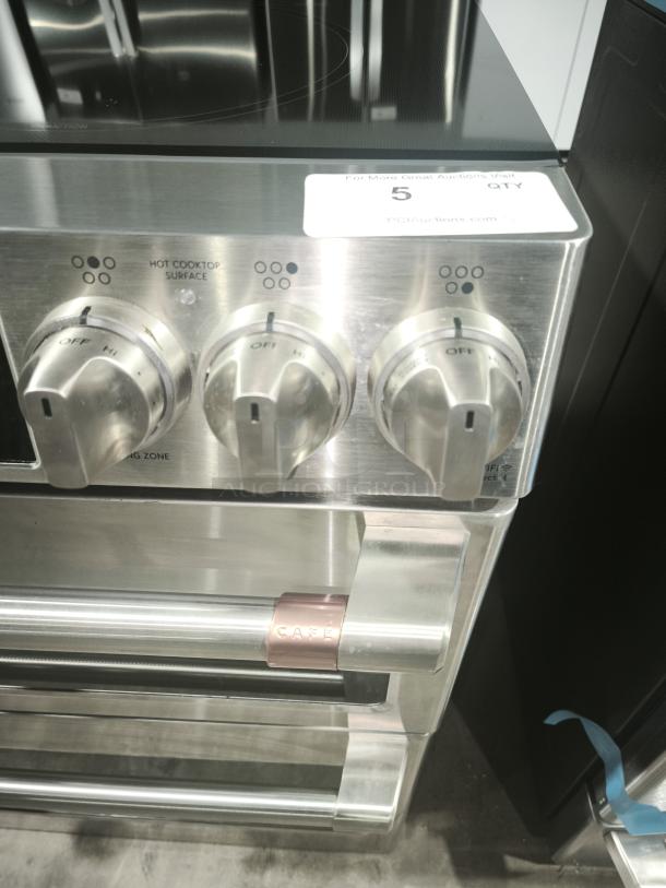 BRAND NEW GE Café 30" Smart Slide-In Double-Oven Range, Model CHS950P2MS1, with minor scratches and dents.