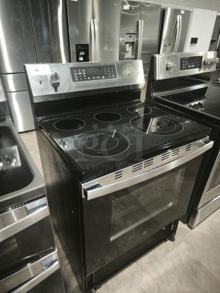 GE 30-inch Freestanding Electric Convection Range, Model GRF600AVSS, black, smart/WiFi features, scratch and dent condition.