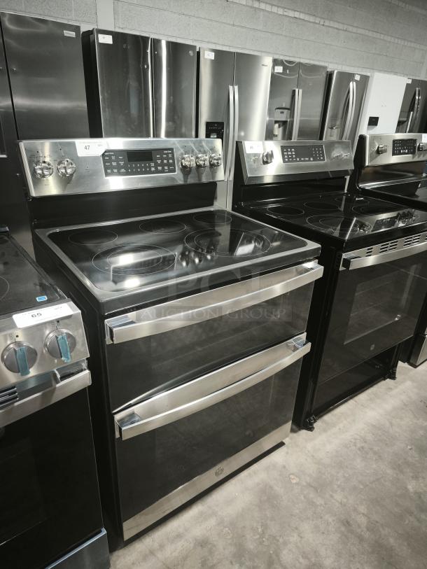 BRAND NEW GE JBS86SPSS electric double oven range, free-standing, convection, scratch and dent condition, stainless steel finish.