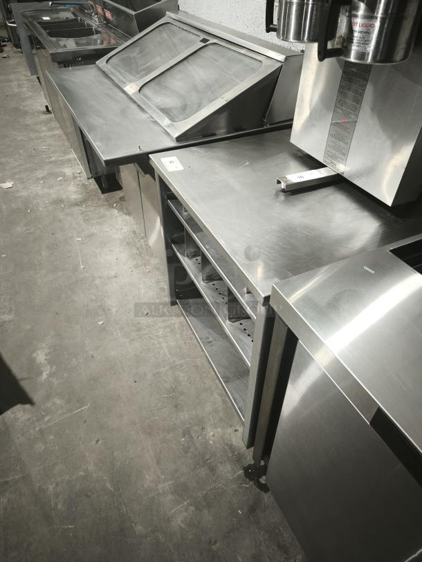 S&G Manufacturing BERS27 custom stainless steel table, features multiple shelves, sleek design, excellent condition.