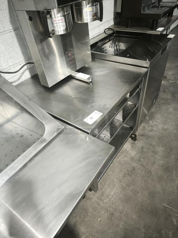 NICE CUSTOM stainless steel table by S&G MANUFACTURING, model BERS27, industrial design, excellent condition, with shelving.