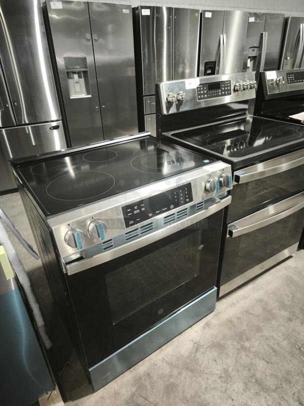 NEW GE® 30″ Slide-In Electric Range, Model GRS500PVSS, with Crisp Mode, stainless steel finish, brand new condition.
