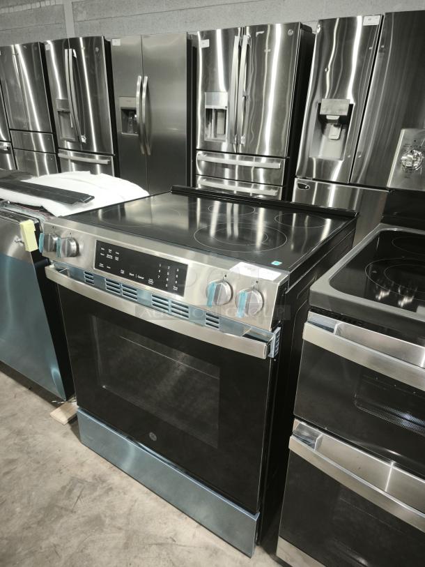 NEW GE 30" Slide-In Electric Range, Model GRS500PVSS, featuring Crisp Mode, stainless steel finish, excellent condition.
