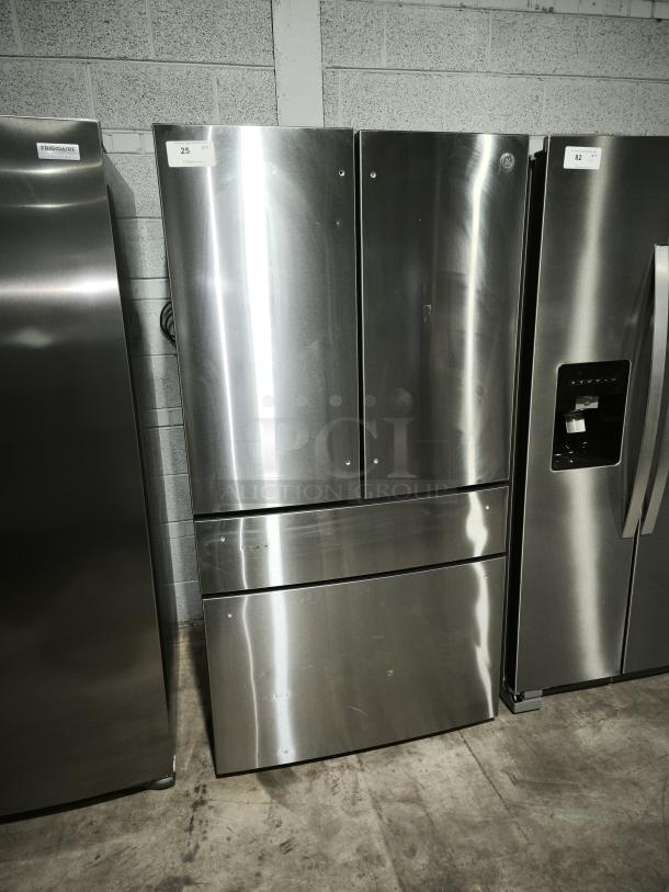 GE Profile™ 4-Door French Door Refrigerator, model PGE29BYTFS. Fingerprint-resistant stainless steel. Good condition.