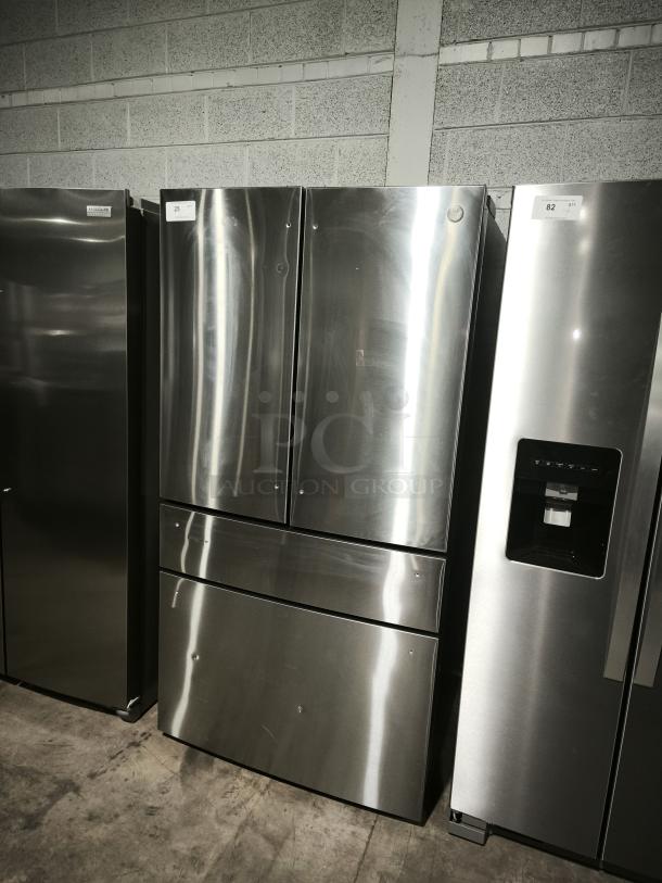 GE Profile™ 28.7 cu ft 4-Door French Door Refrigerator, model PGE29BYTFS, stainless steel, fingerprint-resistant, good condition.