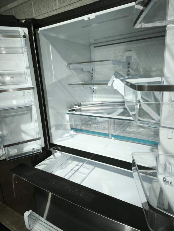 GE Profile™ 4-Door French Door Refrigerator, model PGE29BYTFS, 28.7 cu ft, fingerprint-resistant, dual-dispense AutoFill pitcher, excellent condition.