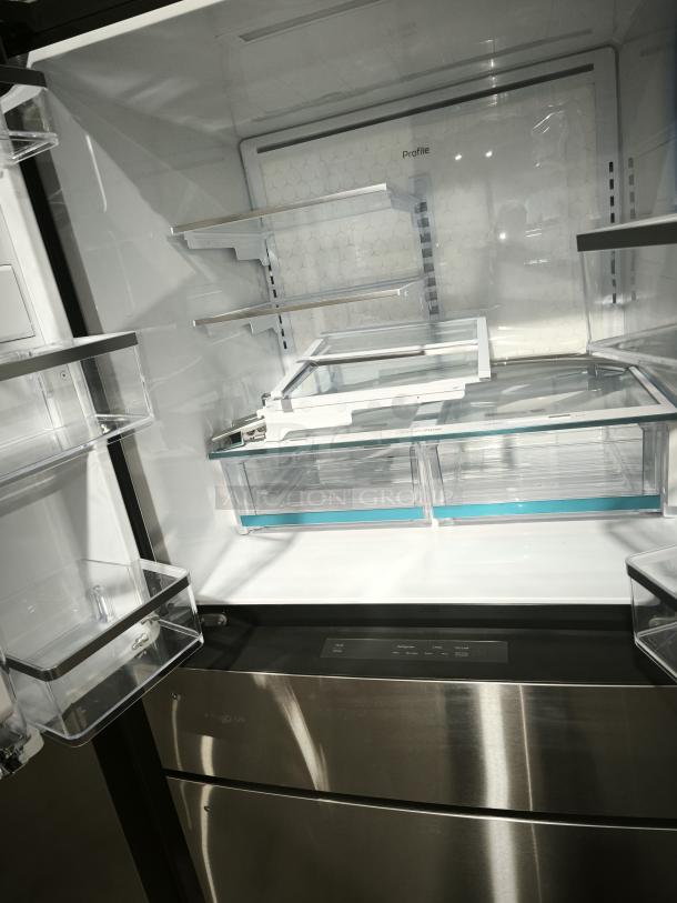 GE Profile™ 28.7 cu ft 4-Door French Door Refrigerator, model PGE29BYTFS, featuring fingerprint-resistant finish, adjustable shelves, and Dual-Dispense AutoFill Pitcher.