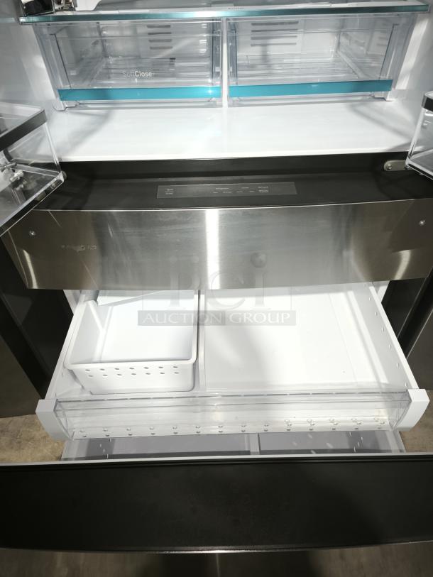 GE Profile™ 4-Door Refrigerator, Model PGE29BYTFS, fingerprint-resistant, dual-dispense AutoFill, spacious interior, soft-close drawers.