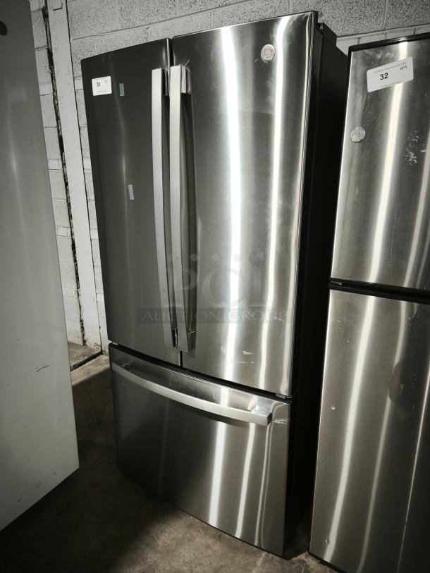GE 27.7 Cu. Ft. Fingerprint-Resistant French-Door Refrigerator, model GFE28GYNFS, stainless steel, shown in good condition.