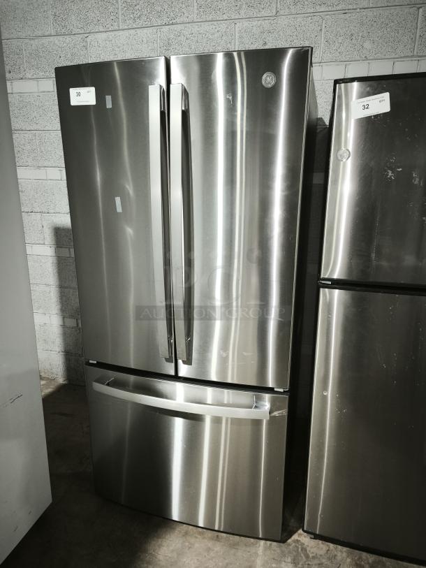 GE 27.7 Cu. Ft. Fingerprint-Resistant French-Door Refrigerator, Model GFE28GYNFS, in stainless steel.