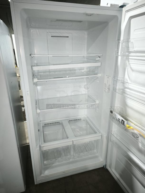 GE Profile™ PVD28BYNFS 27.9 Cu. Ft. smart 4-door French-door refrigerator in good condition, interior view.