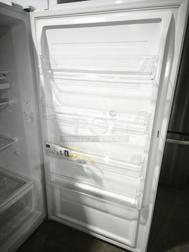 GE Profile™ 27.9 Cu. Ft. Smart 4-Door Refrigerator, model PVD28BYNFS, open door showing storage compartments.
