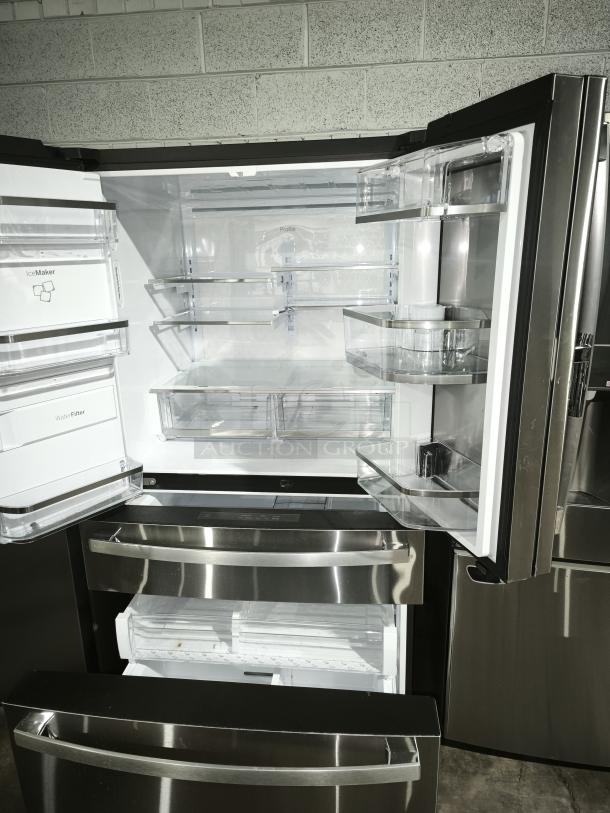 GE Profile 27.9 Cu. Ft. French-Door Refrigerator, Model PVD28BYNFS, fingerprint-resistant, door-in-door feature, spacious interior.