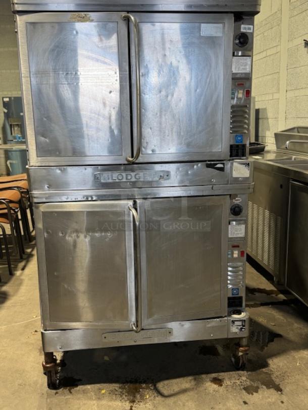 Blodgett EF-111 electric full-size convection oven, stainless steel exterior, visible control panels, dual doors, on casters.