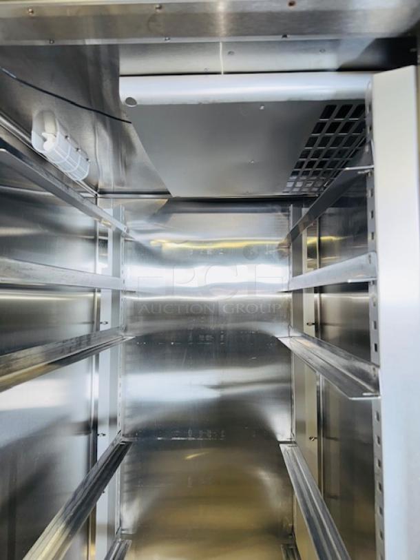 Traulsen RHT132WUT-FHS stainless steel reach-in refrigerator interior, like new condition, 24.2 cu. ft., 115V, 7 Amps.