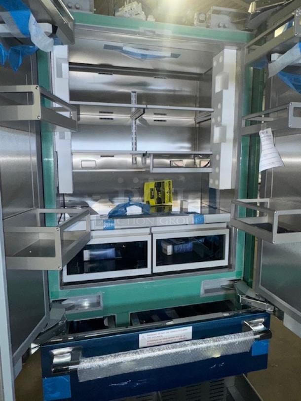 Brand new Thermador Freedom T36BT120NS 36" stainless steel built-in French door bottom freezer refrigerator.