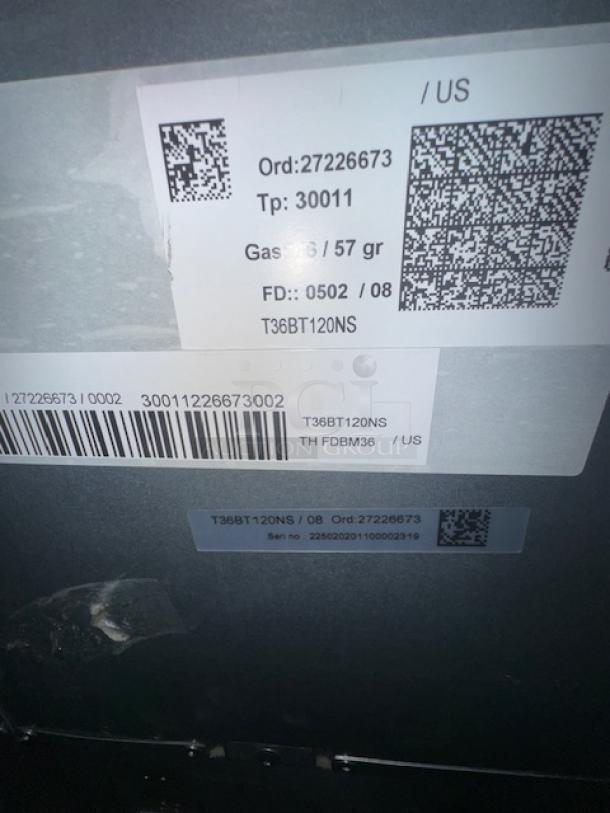 Brand new Thermador Freedom French Door Bottom Freezer, model T36BT120NS. Labels show order and model details.