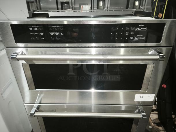 Brand new KitchenAid KOEC530PSS 30" combo microwave wall oven with air fry mode; stainless steel finish, dual doors, control panel.