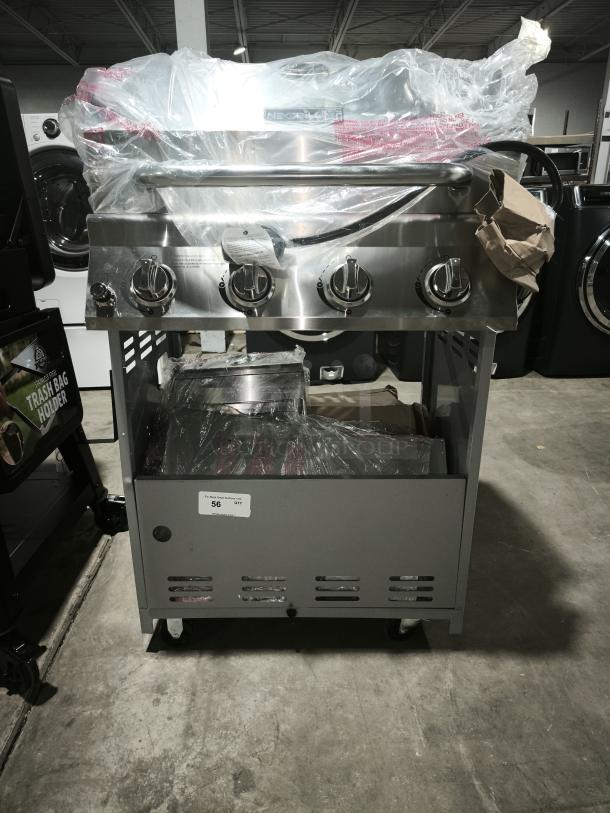 Brand new Nexgrill 4 Burner Grill, Model 720-0830H. Silver finish, wrapped in plastic. Features side burner, control knobs.