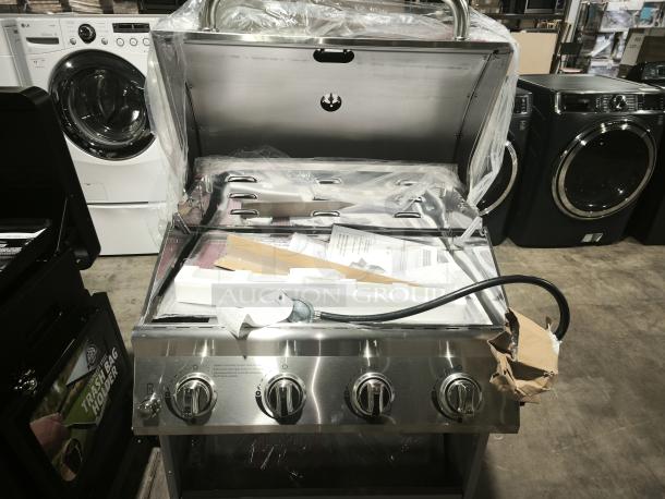 Brand new Nexgrill 720-0830H, 4-burner, side shelf, silver finish, unopened packaging, includes hose and user manual.