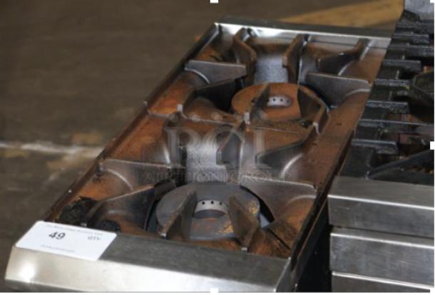 Avantco NAM-2210 stainless steel commercial 2 burner range, natural gas, 50,000 BTU, good condition. Auction tag visible.