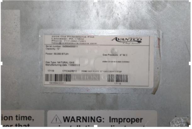 Avantco NAM-2210 stainless steel commercial gas range label, showing 50,000 BTU and natural gas specifications.