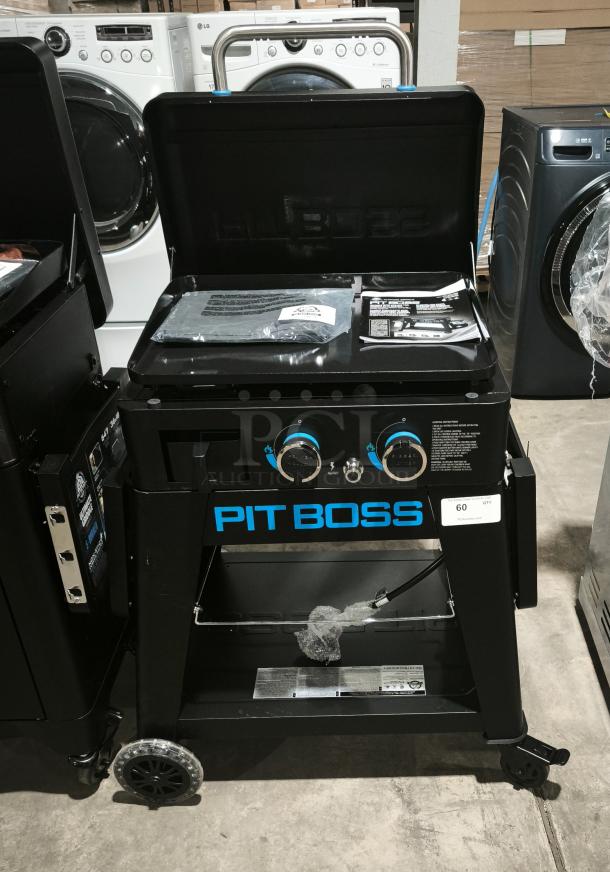 Brand new Pit Boss Ultimate Lift-Off Griddle PB2BGD2, featuring dual burners, sleek black design, and adjustable settings.