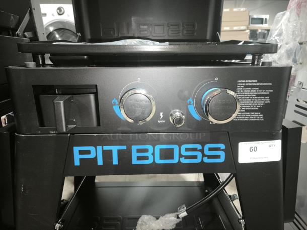 Brand new Pit Boss Ultimate Lift-Off Griddle PB2BGD2, featuring dual burners, igniter, and Pit Boss branding.