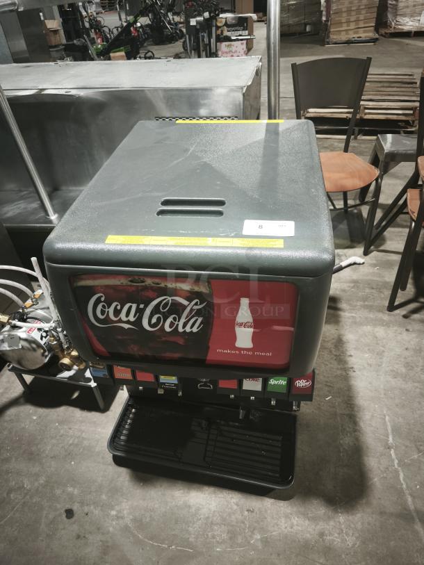 Enduro 175 Ice Drink Dispenser, model ED175K8, with Coca-Cola branding, multiple selection options, in used condition.