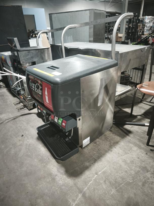 Enduro ED175K8 ice drink dispenser, Coca-Cola branding, stainless steel, dual handle design, includes drip tray, used condition.