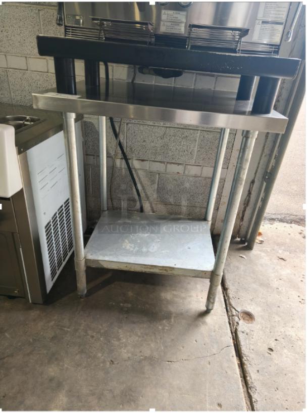 Regency 30" x 36" 16-Gauge 304 Stainless Steel Work Table with Undershelf, commercial grade, used condition.