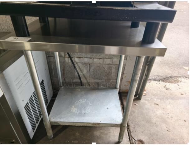 Regency 30" x 36" 16-gauge 304 stainless steel commercial work table with undershelf, used condition.