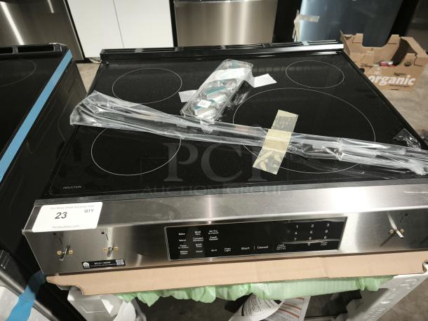 GE Profile 30″ Smart Slide-In Induction Range, Model PHS700AY1FS, new condition, with controls and oven tray.