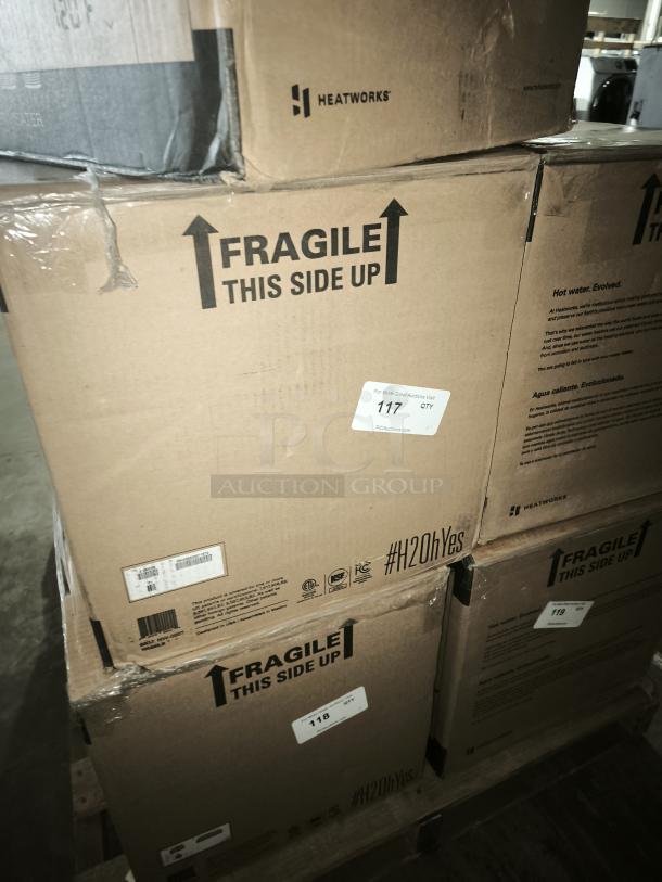 Heatworks Model 3 tankless smart water heater boxes. Labeled "Fragile" and "#H2OhYes" with model HW-0007 info.
