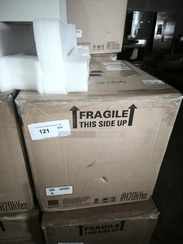 Heatworks Model 3 electric tankless smart water heater HW‑0007 in packaging. Box labeled "Fragile" with product information.