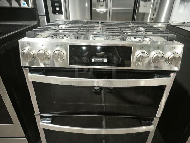 Brand new GE Profile 30″ Smart Slide-In Front-Control Gas Double Oven Convection Range, model PGS960YP4FS, stainless steel finish.