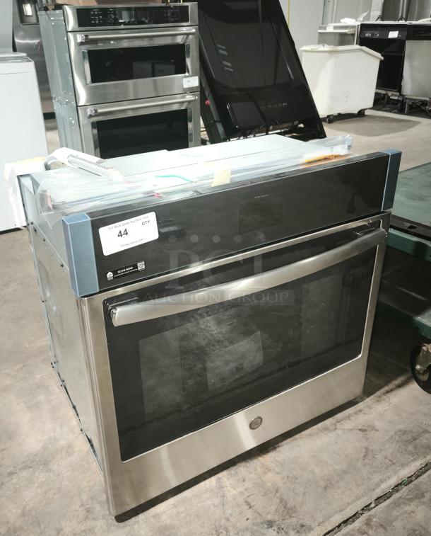 BRAND NEW SCRATCH AND DENT: GE® 30″ Smart Built-In Self-Clean Convection Wall Oven, model JTS5000SV2SS. Slight dents visible.