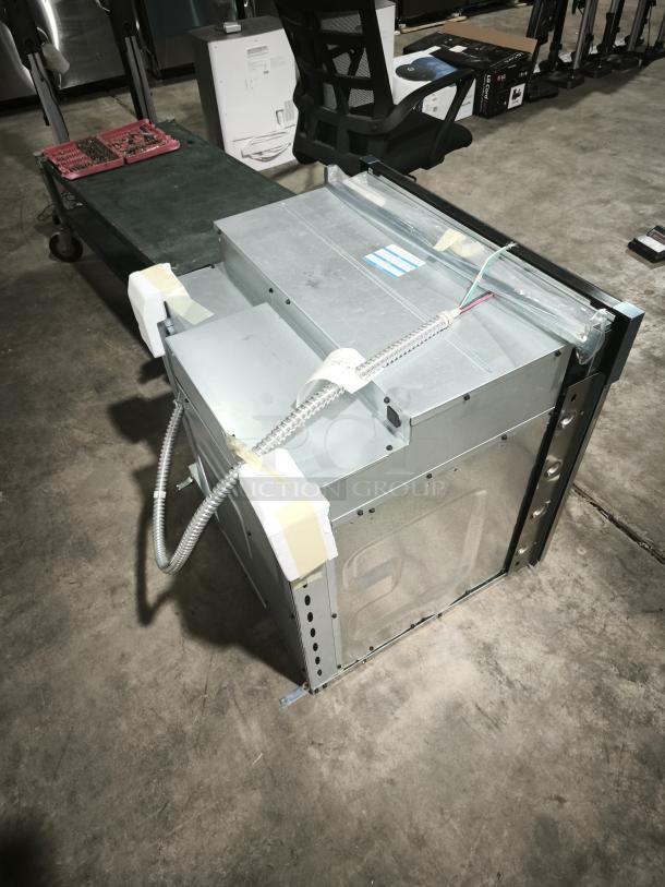 BRAND NEW SCRATCH AND DENT GE 30" Smart Wall Oven, Model JTS5000SV2SS, with self-clean and air fry, in storage.