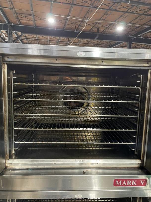 Blodgett Mark V Series double-stacked convection oven, stainless steel, with solid state thermostat, wired oven rack, 480V, on casters.