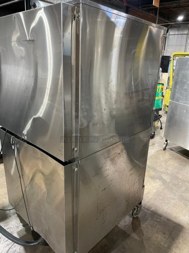 Blodgett stainless steel double stacked convection oven on casters. Includes solid state thermostat, oven rack, gas hose.