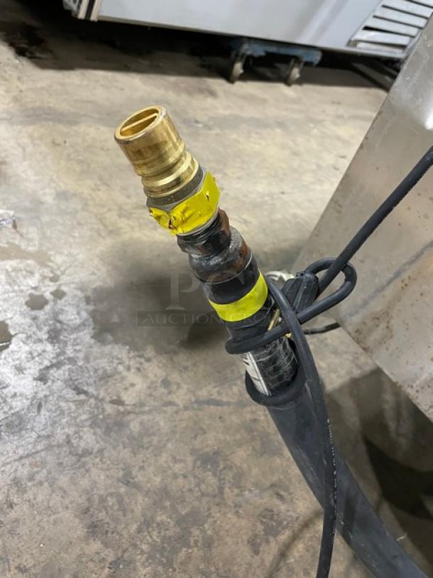 Gas connector hose for Blodgett Dual-Flow Series commercial convection oven, showing brass fitting and wiring.