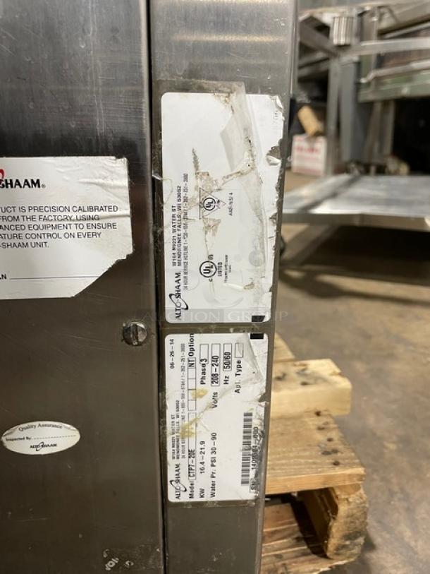 Alto-Shaam stainless steel 8-pan combi oven, model CTP720E, with digital touch controls and probe. Labels show model info.