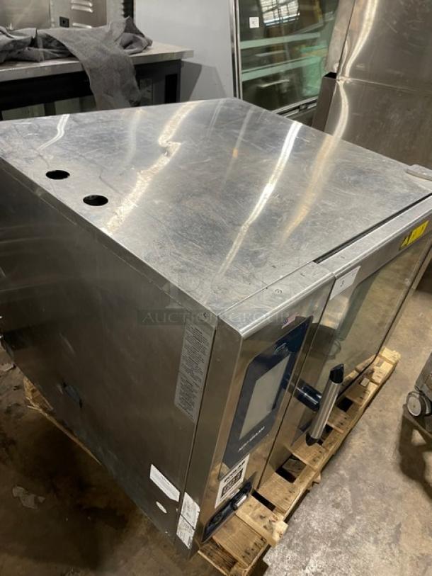 Alto-Shaam CTP720E commercial combi oven, stainless steel, digital touch controls, 8-pan capacity, with probe and rack, on stand.